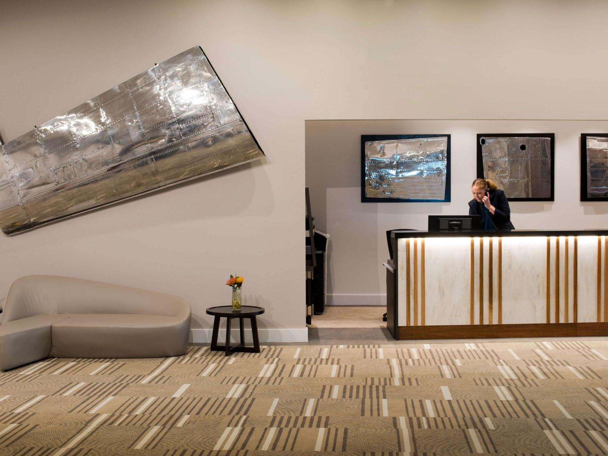 Pullman Brisbane Airport Hotel Exterior foto The reception area at the hotel
